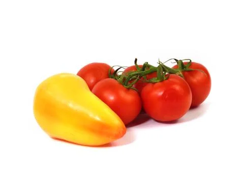 Tomatoes and pepper Stock Photos