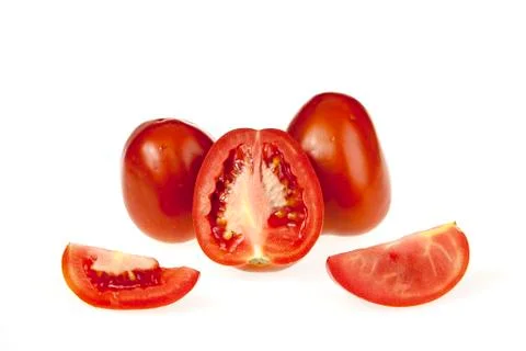 Tomatoes and slice Stock Photos