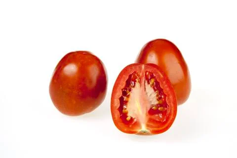 Tomatoes and slice Stock Photos