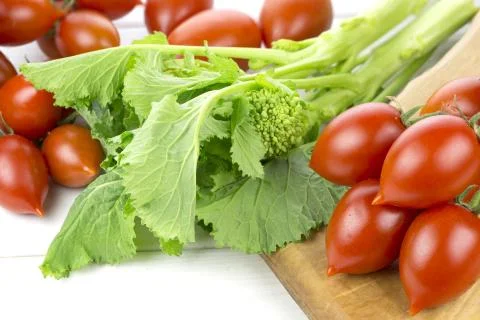 Tomatoes and turnips Stock Photos