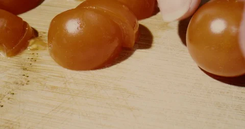 Tomatoes are cut in slow motion part 2 of 2 Stock Footage 127761000