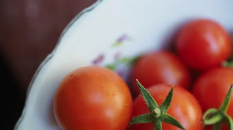 Tomatoes are on the plate Stock Footage 66250024