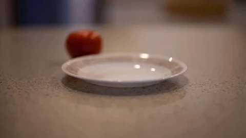 Tomatoes being magically sliced Stock Footage 92439686