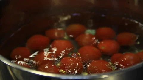 Tomatoes being washed before cooking Stock Footage 139106196