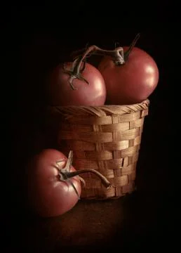 Tomatoes on black background Stock-Fotos