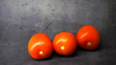 Tomatoes on a black background. vegetables on black background. Stock Footage 99587058