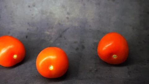 Tomatoes on a black background. vegetables on black background. Stock Footage 99587060