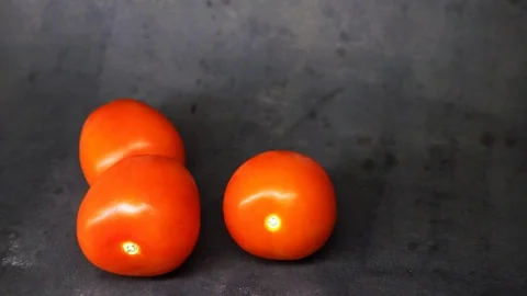Tomatoes on a black background. vegetables on black background. Stock Footage 99587063