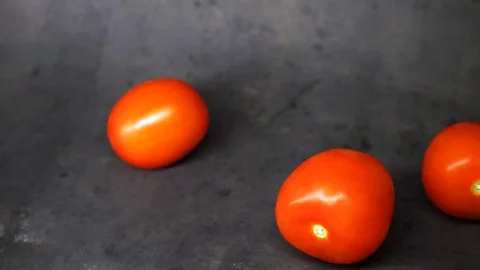 Tomatoes on a black background. vegetables on black background. Stock Footage 99587066