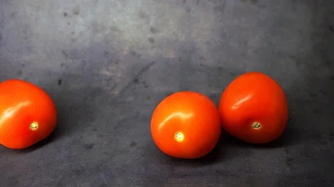 Tomatoes on a black background. vegetables on black background. Stock Footage 99587082