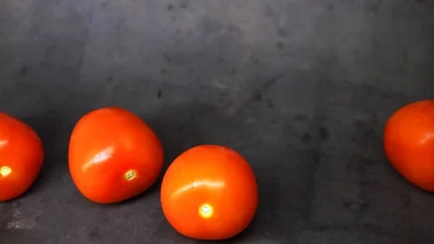 Tomatoes on a black background. vegetables on black background. Stock Footage 99587116