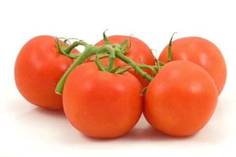 Tomatoes bunch on white background Stock Photos