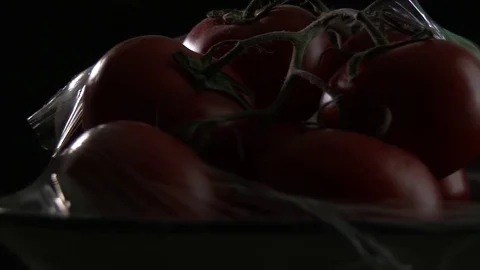 Tomatoes. Camera slides across ripe tomatoes 動画素材 78338906