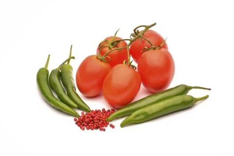 Tomatoes, chilli and pepper on white background Stock Photos