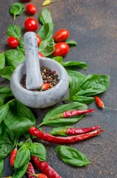Tomatoes, chilli, basil and peper spice Stock Photos