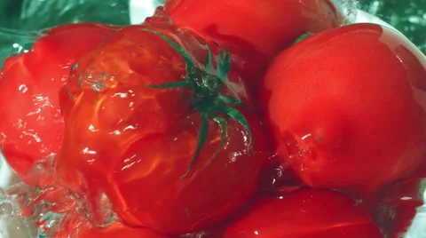 Tomatoes in a colander to clean running water Stock Footage 60599277