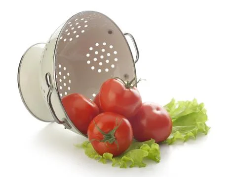 Tomatoes in the colander Stock Photos