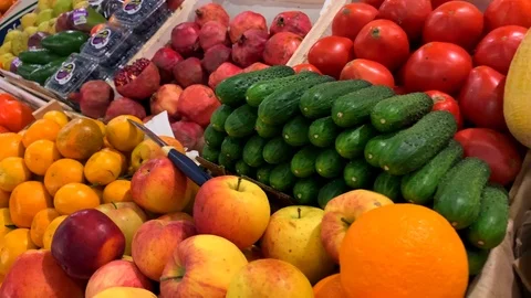 Tomatoes, cucumbers, melon, lemon, oranges, apples, pomegranates, persimmons Stock-Footage 118430796