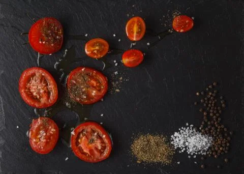 Tomatoes cut in half. Cherry tomatoes on cutting board Stock Photos