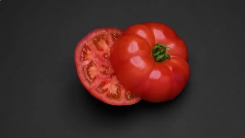 Tomatoes cut in half Video stock 308511473