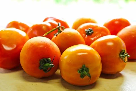 Tomatoes on a cutting board Stock Photos