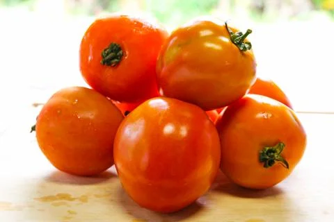Tomatoes on a cutting board Stock Photos