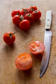 Tomatoes on cutting board 写真素材
