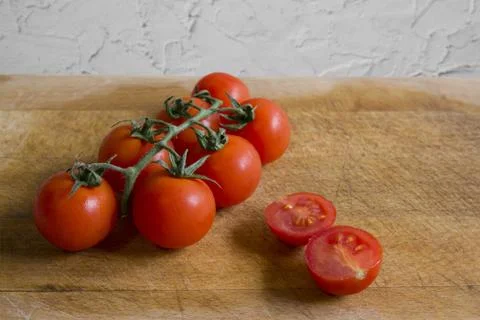 Tomatoes on cutting board 写真素材