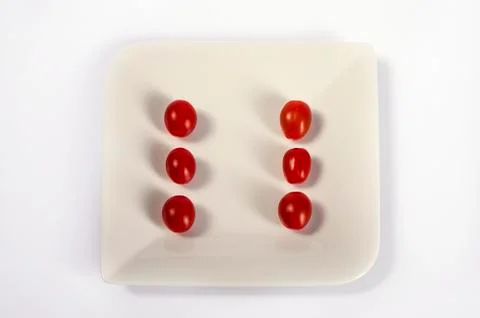 Tomatoes as dice isolated on white Stock Illustration