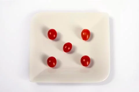Tomatoes as dice isolated on white Stock Illustration