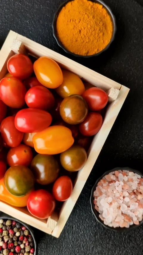 Tomatoes of different colors as a vegetable meal Stock Footage 305647298