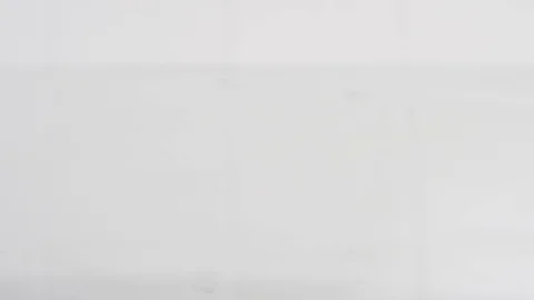 Tomatoes fall on a table with water Stock Footage 84977039