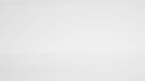 Tomatoes fall on a table with water Stock Footage 84977070