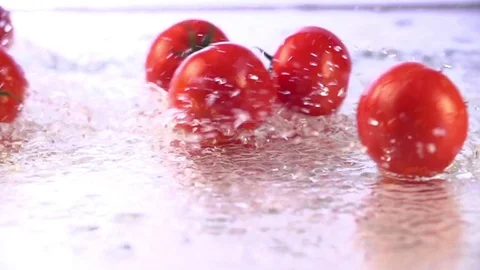 Tomatoes Falling in Slow Motion Stock Footage 76432619