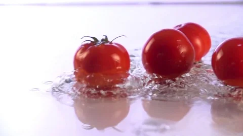 Tomatoes Falling in Slow Motion Stock Footage 76432627