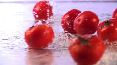 Tomatoes Falling in Slow Motion Video stock 76432640