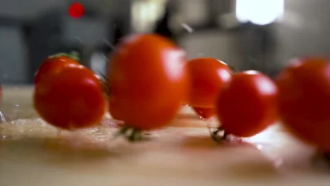 Tomatoes Falling To table Water In Super Slow Motion at. Stock Footage 144594166