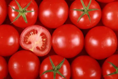 Tomatoes forming a background Stock Photos