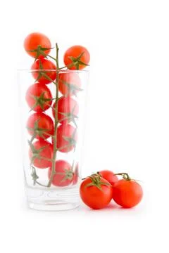 Tomatoes in a glass Stock Photos