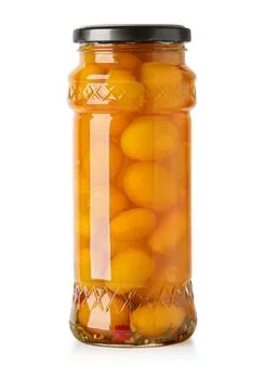 Tomatoes in a jar Stock Photos