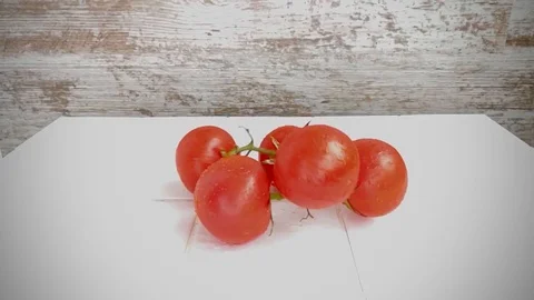 Tomatoes kitchen motion slow motion Stock Footage 128981479