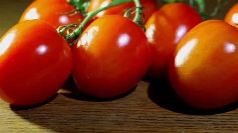 Tomatoes lying on a table . Slider shot Stock-Footage 35916162