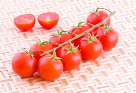 Tomatoes on a mat Stock Photos