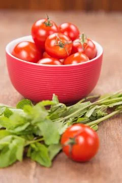 Tomatoes with mint Stock Photos