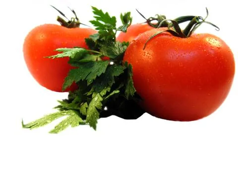 Tomatoes with parsley Stock Photos
