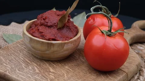 Tomatoes paste background Stock Footage 260162885
