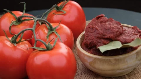 Tomatoes paste close up Stockbeeldmateriaal 260162642