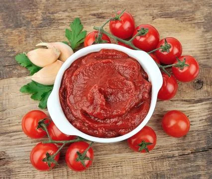 Tomatoes paste Stock Photos