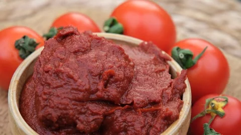 Tomatoes paste rotate Stock Footage 260162667