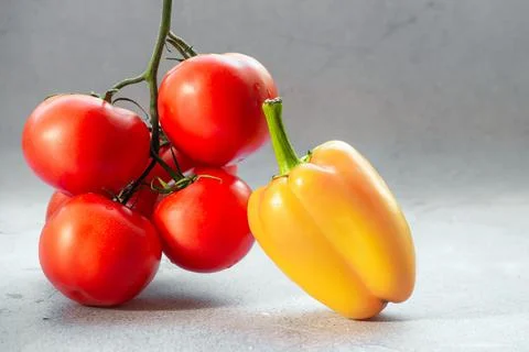 Tomatoes with pepper Stock Photos